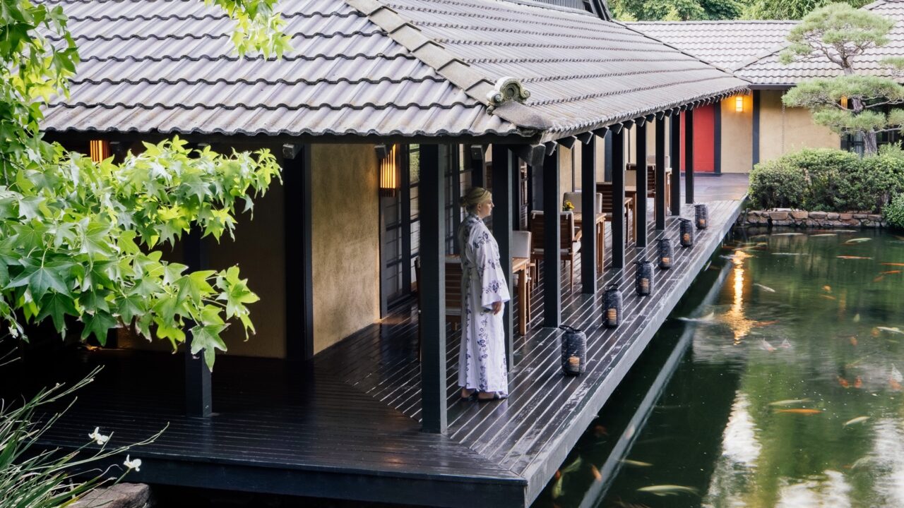 Golden Door, Woman at Koi Pond, Spas of America