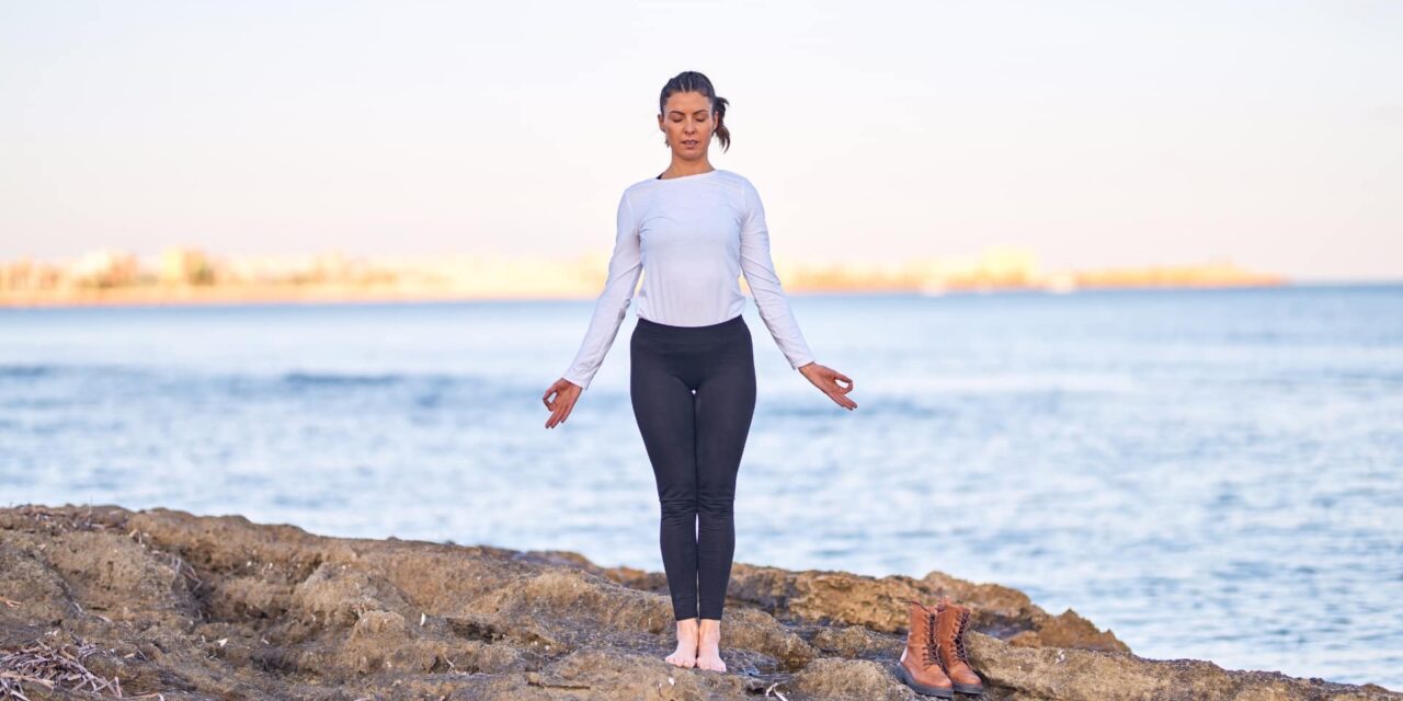 https://www.spasofamerica.com/wp-content/uploads/2024/10/Mountain-Pose-Blue-Osa-Yoga-Retreat-Cultivate-Strength-and-Stability-with-Mountain-Pose-1280x640.jpg