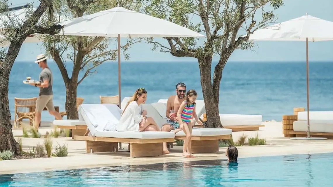 https://www.spasofamerica.com/wp-content/uploads/2024/11/Four-Seasons-Astir-Palace-Hotel-Athens-Kids-Pool.jpg.jpeg